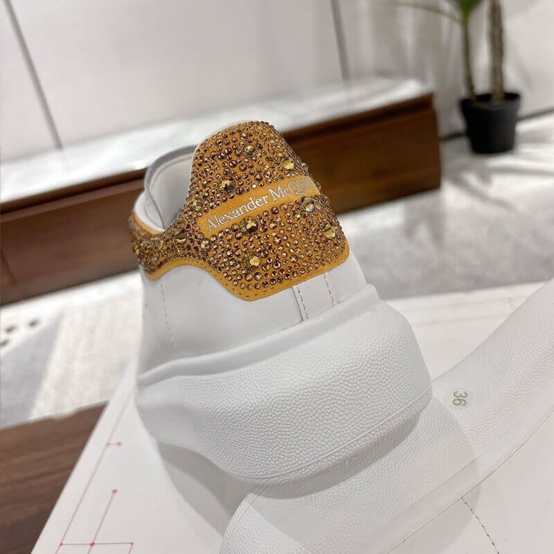 A1exa*der Mcqv*en Oversized Sneaker in White/Gold Glitter 666407